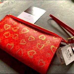 Coral Coach & gold wristlet: Never Worn